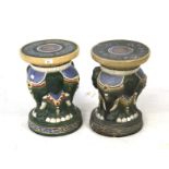 Pair of Chinese ceramic stools. Colourful finish with elephant heads. H44cm x D30cm.