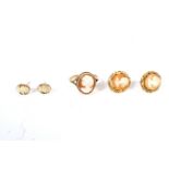 A 9ct gold cameo ring size O, and two pairs of 9ct gold cameo earrings. 7.3 grams.