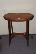 A mahogany kidney shaped occasional table.