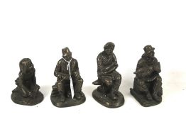 Four bronze effect figures. Max H17cm.