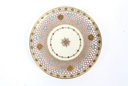 A Goode of London blush ivory fretwork plate decorated with coloured beads and central star burst,