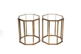 Two contemporary gilt-metal glass topped octagnal occasional tables.