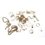 An assortment of scrap gold chains, cufflink, earnings, etc. 25.