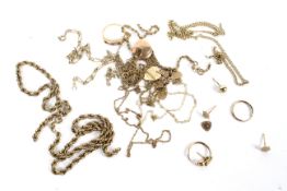 An assortment of scrap gold chains, cufflink, earnings, etc. 25.