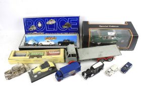 A collection of assorted diecast model cars.