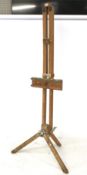 Beech framed floor standing artist folding easel. On adjustable stand, H186cm.