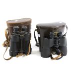 Two pairs of assorted vintage cased binoculars.