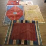 A group of contemporary rugs.