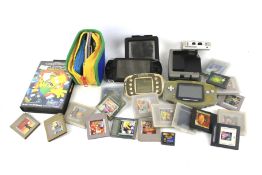 A collection of assorted vintage handheld computer consoles.
