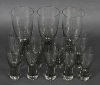 A collection of mid-century smoke tinted Holmegaard Canada series drinking glasses by Per Lutken.