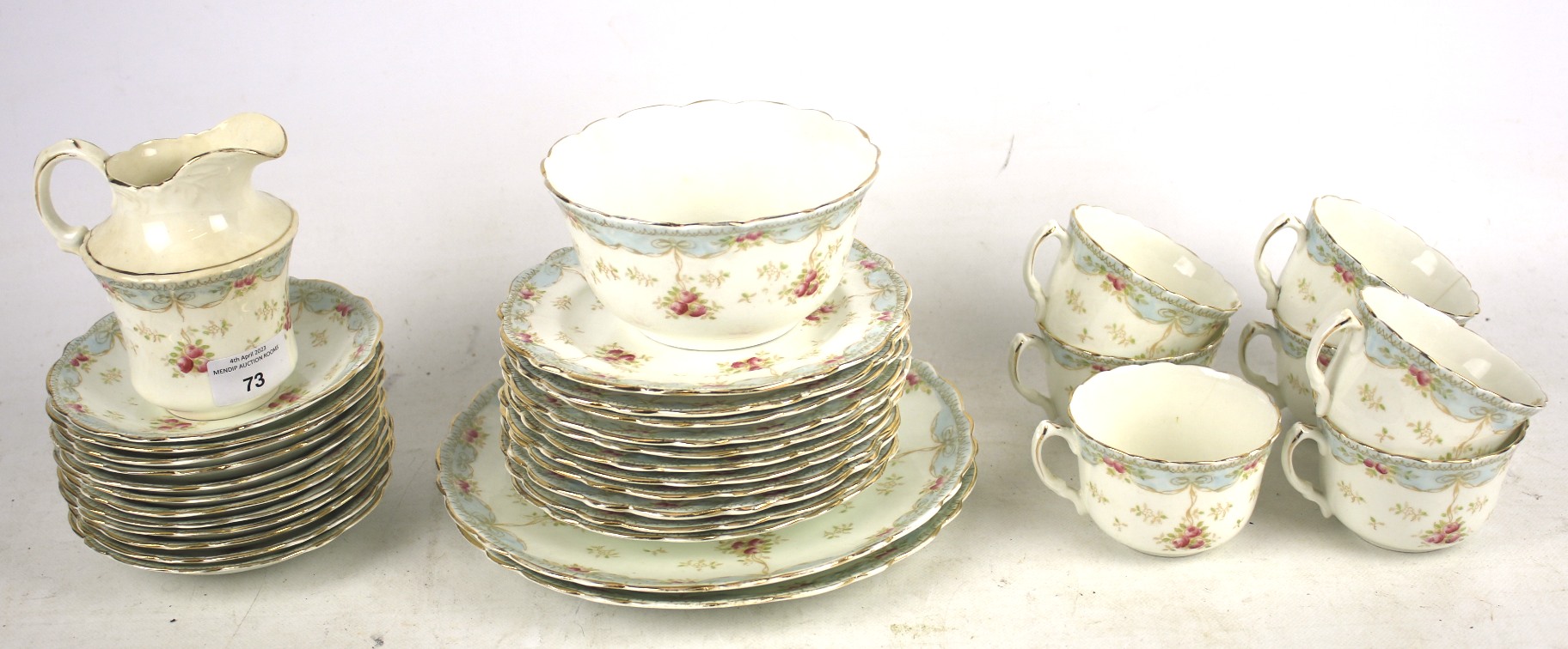 A vintage GW & Sons Queens China seven person tea service.