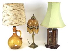 Three 20th century table lamps.