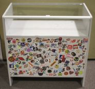 A modern glass top shop display counter cabinet.