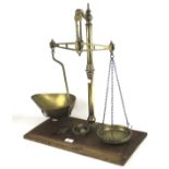 A set of brass Bay & Millward balance scales.