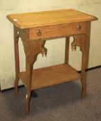 An oak Arts and Crafts hallway table. With a single drawer and shelf below.