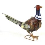 A contemporary pressed metal painted pheasant figurine.