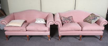 A pair Wesley-Barrell two seater sofas.