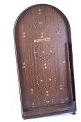 A vintage wooden bagatelle board.