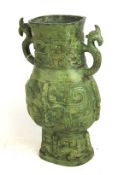 A 20th century Hu style Chinese bronze two-handled vase.