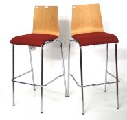 A pair of Dams contemporary chrome and beech effect upholstered bar stools.
