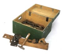 A wooden tool box and contents.