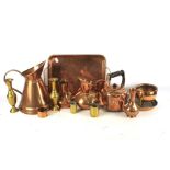 An assortment of 19th century and later copper. Including jugs, twin handled tray, kettle, etc.