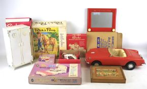 A collection of assorted vintage toys and games.