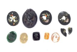A collection of 9 intaglios, cameos and pietra dura decorated with flowers and loose gemstones.