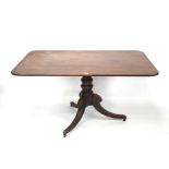 A 19th century mahogany tilt-top table.