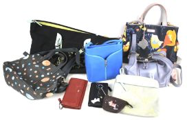 A collection of Radley handbags and purses.