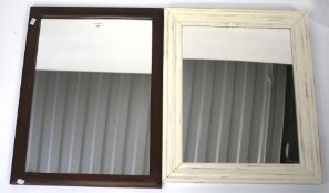 Two contemporary wall mirrors.