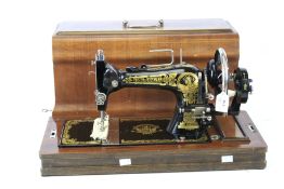 A Victorian Frister & Rossman sewing machine.