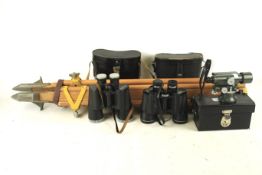 Two pairs of binoculars, a scope and a tripod.
