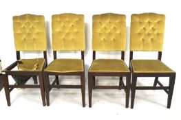 A set of four Edwardian mahogany upholstered dining chairs.
