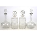 Two pairs of 20th century glass decanters and stoppers.