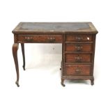 A Victorian oak desk.