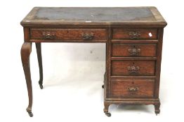 A Victorian oak desk.