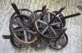 Eight cast metal wheels.