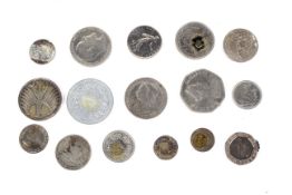 An assortment of mixed coinage. Two include a Victorian Florin and shilling, etc.
