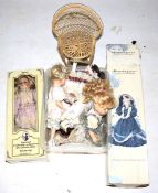 Six porcelain dolls together with a selection of clothing.