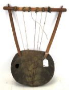 An African Endongo (stringed musical instrument).