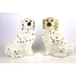 A pair of Staffordshire spaniels.