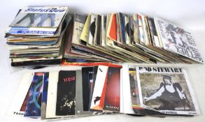 A collection of 1960s to 1990s 45 RPM 7" vinyl single records.