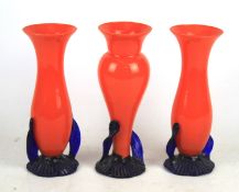 Three 1960s orange and blue glass vases.