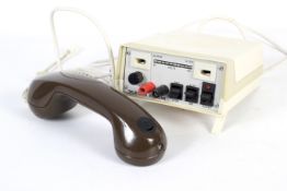 A vintage Teletron Systems telephone tester. Comes with hand set.