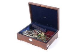 A box of assorted costume jewellery. To include necklaces, bracelets, watches, rings, etc.