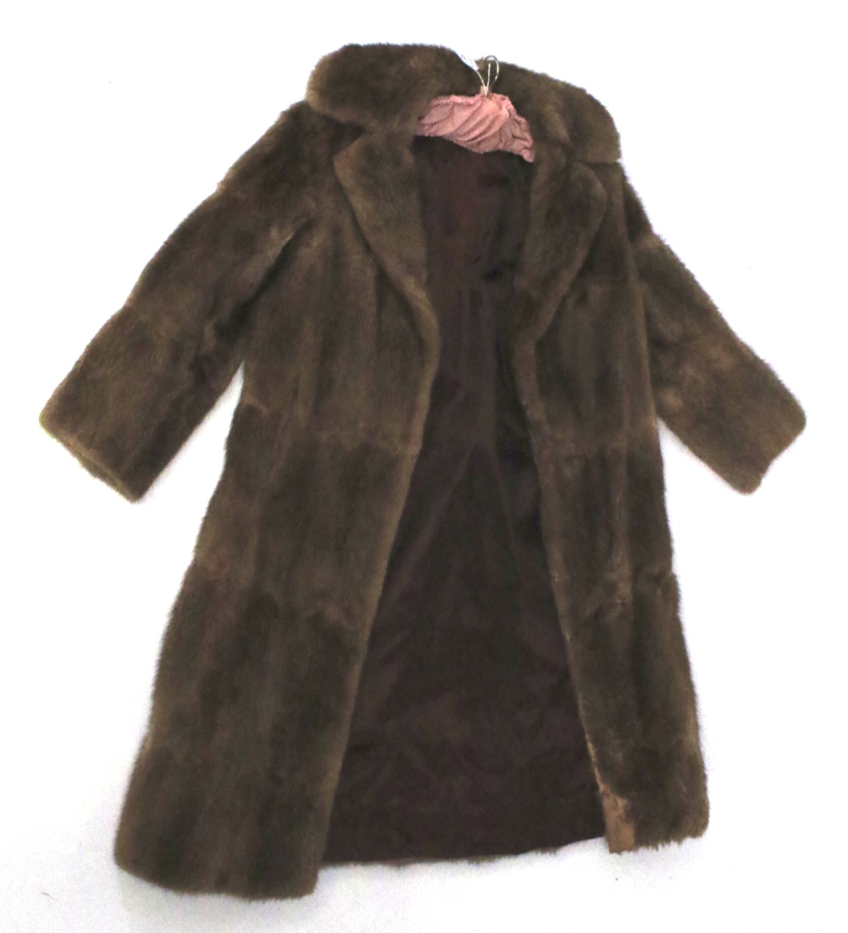 A ladies vintage brown fur coat.