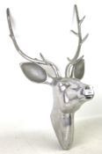 A contemporary chrome wall ornament modelled as a deer head.
