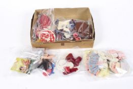 A collection of assorted vintage Faerie Glen Wear sets of doll's clothing.