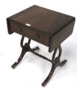 A 20th century mahogany drop leaf occasional table.